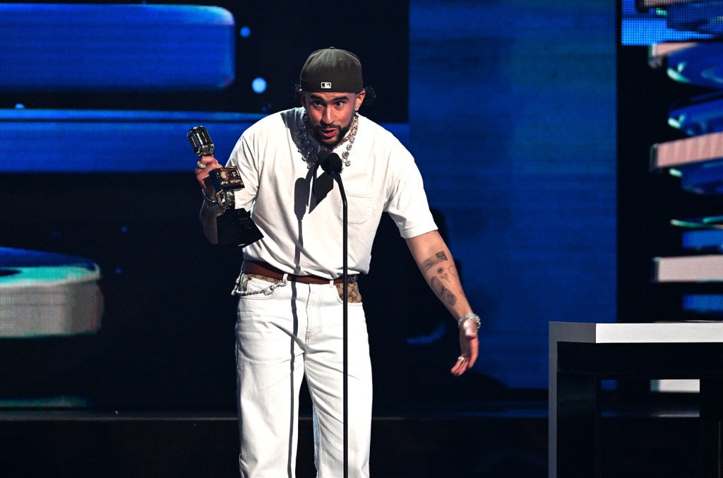 Bad Bunny receiving awards at Billboard Latin Music Awards 2025